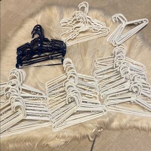 Lot of 106 childrens White and Blue Plastic Hangers